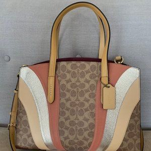 Coach Charlie Carryall Signature Canvas